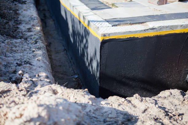 Professional Waterproofing technician working in Olney, IL